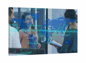 Analyzing business team discussing holographic data on glass wall in office, with tablet clipboard