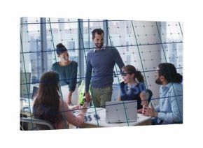 Discussing five professionals reviewing data and planning in office with laptops smartphone papers