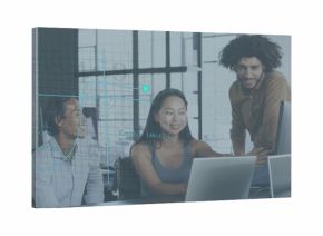 Working team in business wear leaning over laptops pointing at screen in modern office data overlay