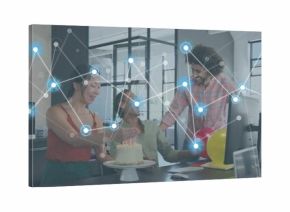 Celebrating 3 coworkers in office attire reaching toward cake at open office with digital overlay