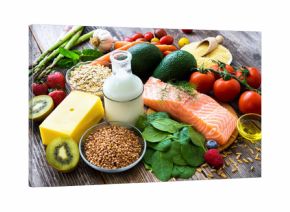 Selection of healthy food on rustic wooden background