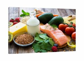 Selection of healthy food on rustic wooden background