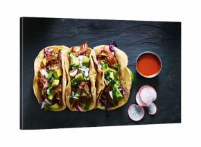 three mexican pork carnitas tacos flat lay composition