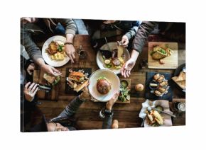 Friends all together at restaurant having meal