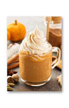 Pumpkin spice latte in a glass mug