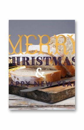 Resting sliced white bread on cutting board on tabletop, with knife, bowl, wheat stalks and napkin