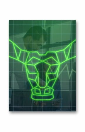 Floating neon green bull graph overlay rising over office desk, with professionals using tablet