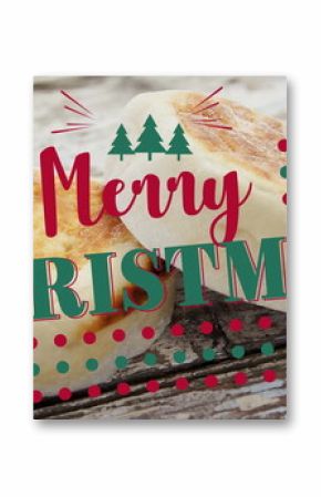 Displaying two toasted English muffins on rustic wooden tabletop with Merry Christmas overlay