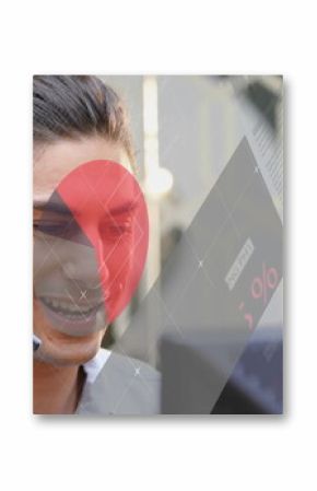 Smiling agent wearing headset and viewing monitor at office with digital overlays, copy space