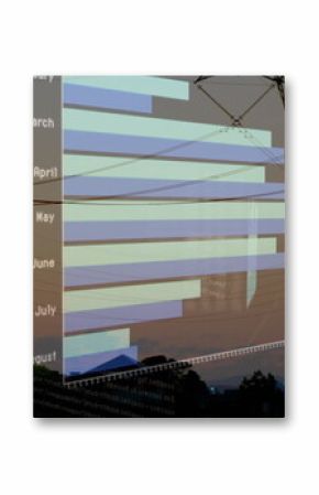 Bar chart showing monthly data in dusk field, with transmission towers power lines code overlay