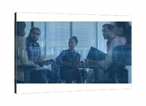 Collaborating colleagues exchanging insights in modern conference room, overlaying digital charts