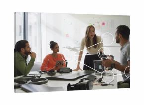 Leading standing woman leaning on table guiding design meeting in office, with drone, VR headset