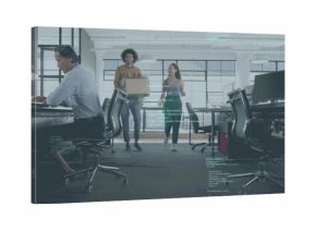 Walking colleagues in casual attire holding laptop, passing desks in office with code overlay