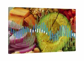 Showing composed bowl on tabletop, featuring halved avocado, red onion, sweet potato, waveform