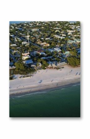 Aerial view of the coastline in Rehoboth Beach occupied by small buildings