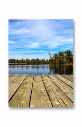 Summer Day At The Lake. Wooden dock overlooking a gorgeous lake in the wilderness. Ludington State Park. Ludington, Michigan.