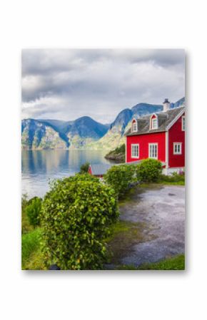 View to Sognefjord in Norway. Small town and cruise port Olden in Norwegian fjords.  Bird view of fjord in Norway.  under a sunny, blue sky, with the typical rorbu houses. View from the top