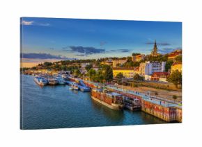 Sunset over Belgrade and ships in the harbor. HDR image