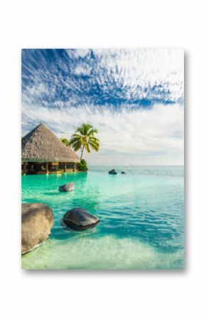 Infinity pool with palm tree rocks, Tahiti, French Polynesia