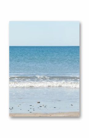 A picture of a beach with a sea background