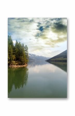 Scenic view of lake against cloudy sky