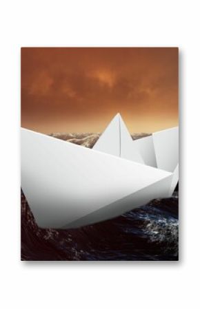 Paper boat floating on the sea