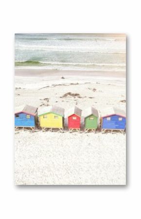 Colorful wooden houses on sand