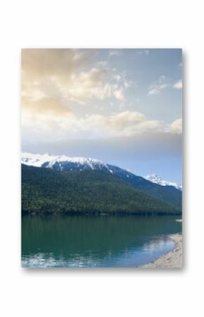 Lake and mountains against sky