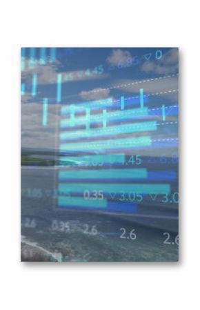 Displaying digital financial charts overlaying rocky coast, with ocean waves and marshy fields