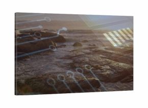 Breaking waves flowing across wet boulders, tide pools at low tide, showing circuit overlay