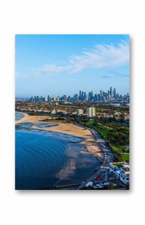 Aerial shot of the coastal Melbourne city in Australia with buildings in on the shore