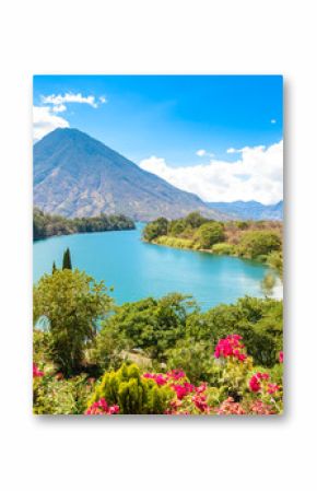 Beautiful bay of Lake Atitlan with view to Volcano San Pedro  in highlands of Guatemala, Central America