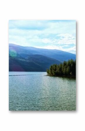 Idyllic view of river by mountains