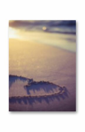 Heart shape on sand at beach