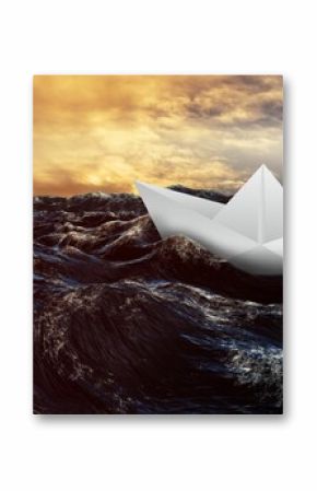 Paper boat floating on the sea