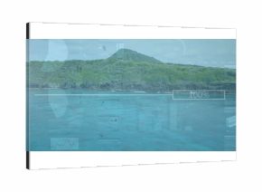 Displaying forested volcanic hill rising above tropical coastline, with digital interface overlays