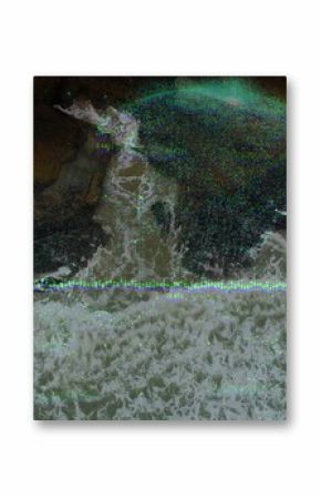 Merging blue circular overlay intersecting rocky shoreline, with waveform, data labels and sea foam