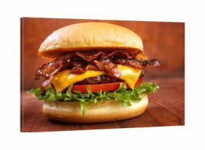 Bacon burger with beef patty on red wooden table