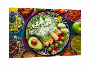 Green enchiladas Mexican food with guacamole