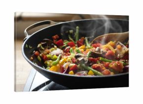 steaming mixed vegetables in the wok, asian style cooking 