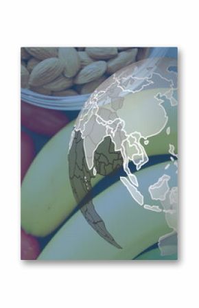 Image of globe over fruits and vegetable lying on table