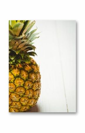 Fresh pineapple on wooden table