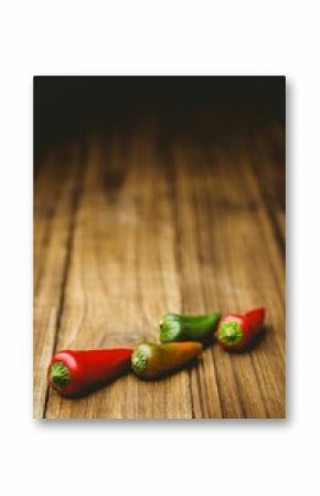 Hot peppers on wooden table