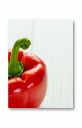 Fresh red pepper on wooden table