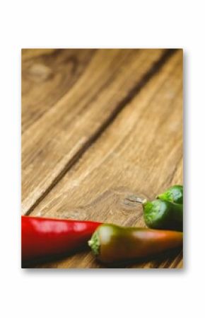 Hot peppers on wooden table