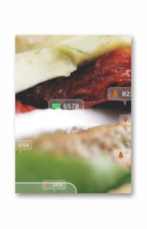 Showing sandwich with lettuce, sundried tomatoes, avocado on counter, with notification icons