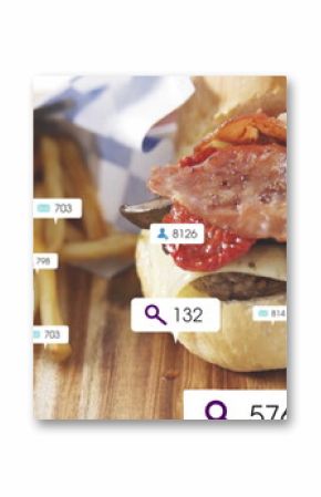 Showing bacon cheeseburger with mushrooms, tomato on studio table, fries, social icons, copy space