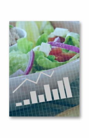 Featuring white salad bowl holding lettuce, tomato, and cheese on wooden table, with data overlay