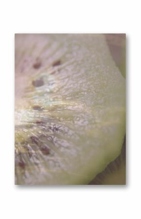Displaying three green kiwi fruit slices on brown cutting board, highlighting radial seed pattern