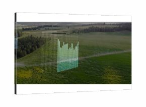 Displaying holographic overlay with 3D bar chart and floating numeric matrix above rural farmland